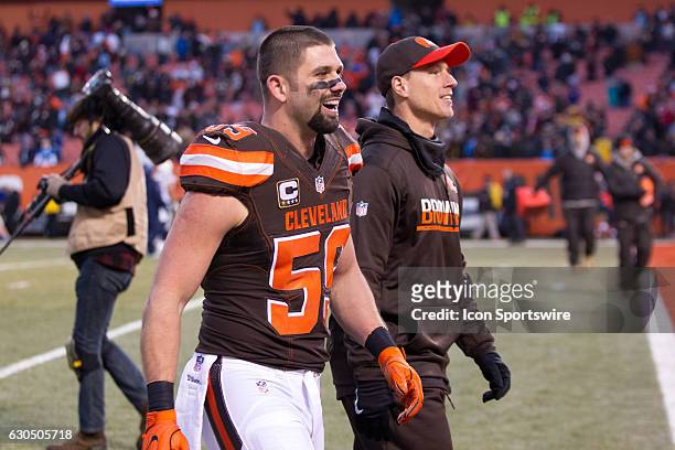 Cleveland Browns Linebacker Tank Carder celebrates as he leaves the field following the National Football League game between the San Diego Chargers...