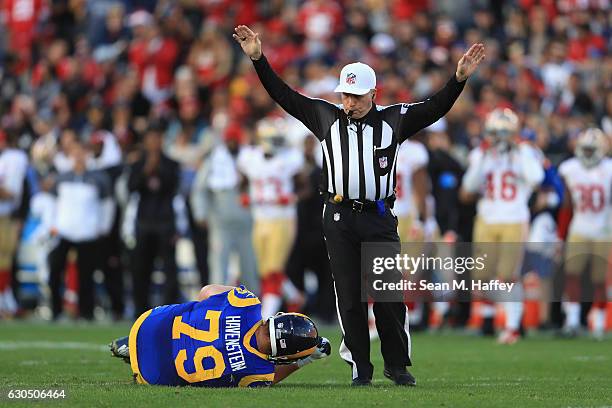 Robert Havenstein of the Los Angeles Rams reacts after suffering an apparent injury during the second half against the San Francisco 49ers at Los...