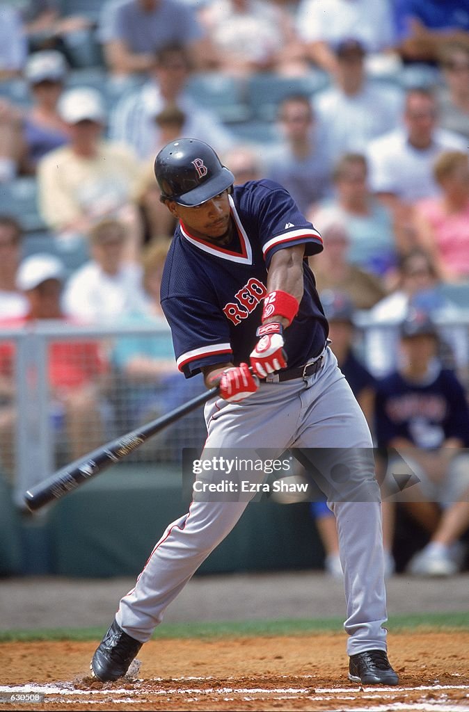 Manny Ramirez of the Boston Red Sox swings at the ballduring the News  Photo - Getty Images