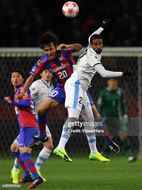 Ryoichi Maeda#20 of FC Tokyo and Eduardo Neto of Kawasaki Frontale compete for the ball during the 96th Emperor's Cup quarter final match between FC...