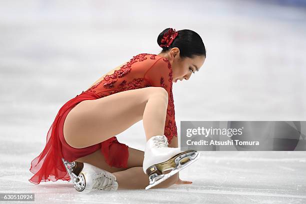 Mao Asada of Japan falls in the Ladies free skating during the Japan Figure Skating Championships 2016 on December 25, 2016 in Kadoma, Japan.