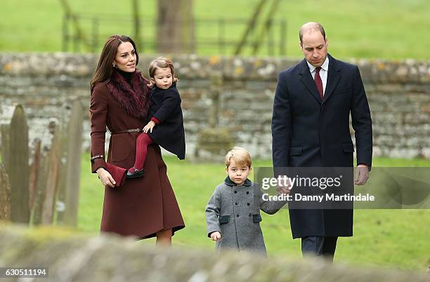 Catherine, Duchess of Cambridge, Prince George of Cambridge, Princess Charlotte of Cambridge and Prince William, Duke of Cambridge attend Church on...