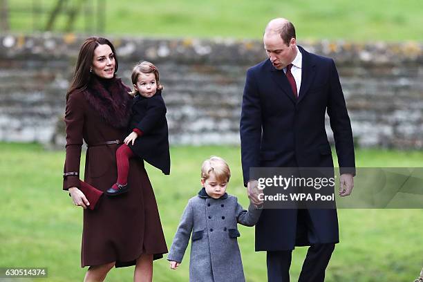 Catherine, Duchess of Cambridge and Prince William, Duke of Cambridge, Prince George of Cambridge and Princess Charlotte of Cambridge arrive to...