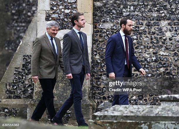 Michael Middleton, James Matthews and James Middleton arrive to attend the service at St Mark's Church on Christmas Day on December 25, 2016 in...
