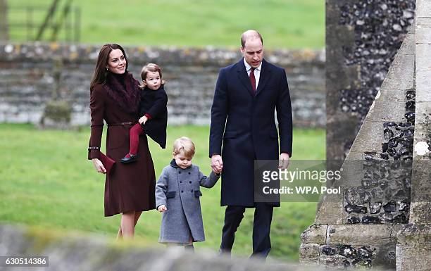 Catherine, Duchess of Cambridge and Prince William, Duke of Cambridge, Prince George of Cambridge and Princess Charlotte of Cambridge arrive to...