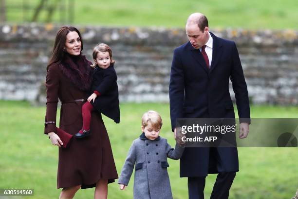 Britain's Prince William , Duke of Cambridge and Catherine, Duchess of Cambridge arrive with Prince George and Princess Charlotte to attend a...