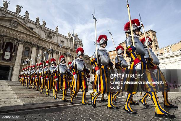 Vatican Swiss Guards leave St. Peter's Square at the end of Pope Francis Christmas 'Urbi et Orbi' blessing message delivered from the central balcony...