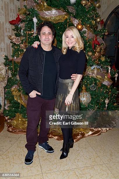 George J. Maloof Jr. And Kelly Carrington attend Adrienne Maloof's Annual Holiday Party with Never Too Hungover on December 24, 2016 in Beverly...