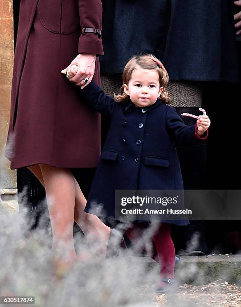 Catherine, Duchess of Cambridge and Princess Charlotte of Cambridge attend a Christmas Day service at St. Marks Church on December 25, 2016 in...