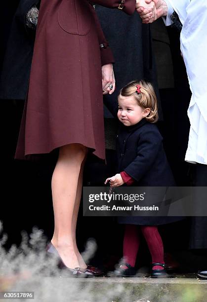 Catherine, Duchess of Cambridge and Princess Charlotte of Cambridge attend a Christmas Day service at St. Marks Church on December 25, 2016 in...