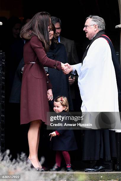 Catherine, Duchess of Cambridge and Princess Charlotte of Cambridge attend a Christmas Day service at St. Marks Church on December 25, 2016 in...