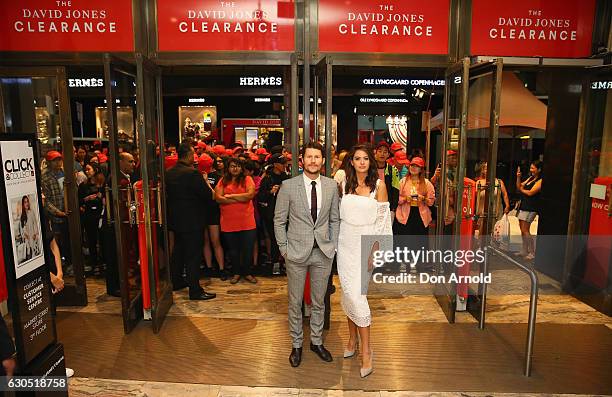 Jason Dundas and Jesinta Campbell pose inside the David Jones Elizabeth St tore just prior to opening during the Boxing Day sales on December 26,...