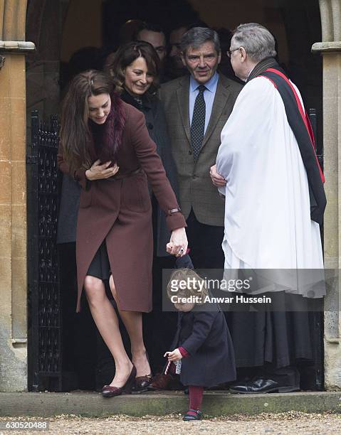 Catherine, Duchess of Cambridge, Princess Charlotte of Cambridge, Carole Middleton and Michael Middleton attend a Christmas Day service at St. Marks...