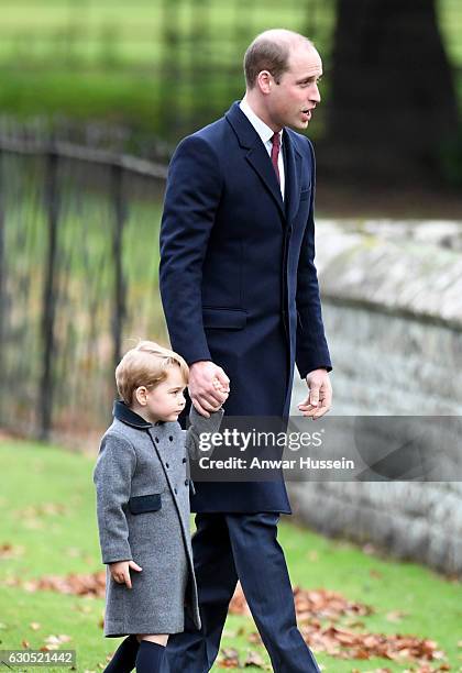 Prince William, Duke of Cambridge and Prince George of Cambridge attend a Christmas Day service at St. Marks Church on December 25, 2016 in...