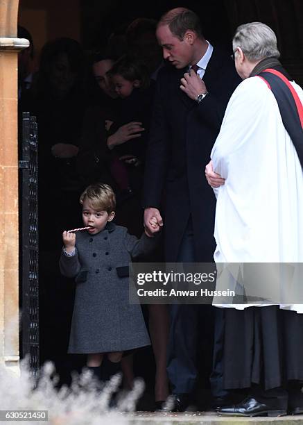 Prince William, Duke of Cambridge and Prince George of Cambridge attend a Christmas Day service at St. Marks Church on December 25, 2016 in...