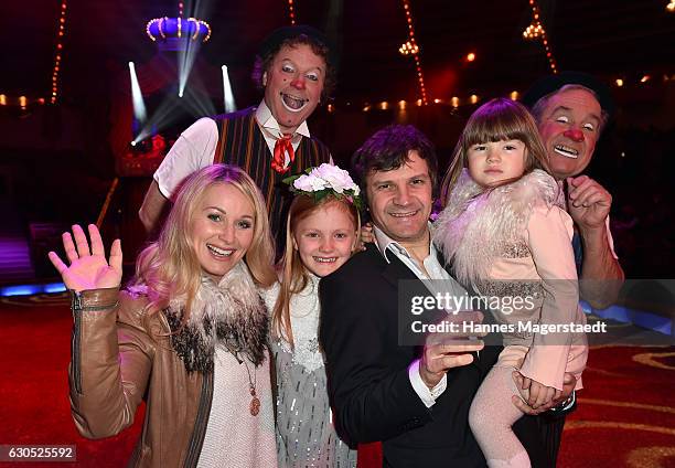 Eva Gruenbauer and her husband Richard George with children Amelie George and Lisanne George during the premiere of 'Tierisch gut' at Circus Krone on...