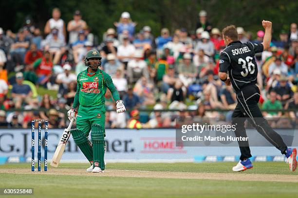 Tim Southee of New Zealand celebrates the wicket of Imrul Kayes of Bangladesh during the first One Day International match between New Zealand and...