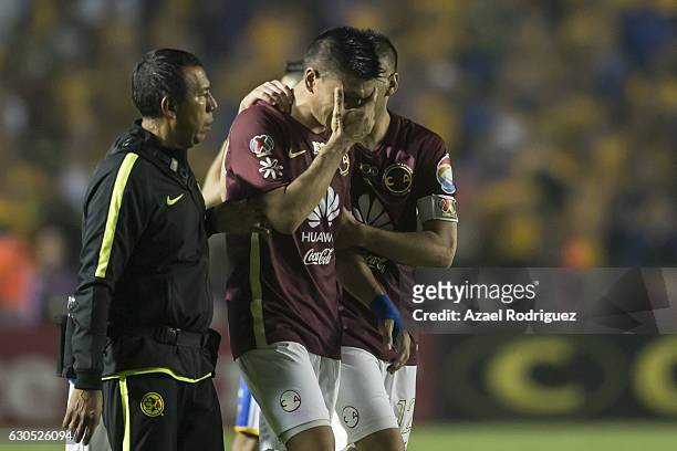 Paolo Goltz of America gets off the field after receiving a red card during the Final second leg match between Tigres UANL and America as part of the...