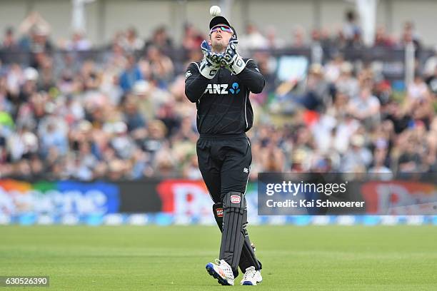 Luke Ronchi of New Zealand takes a catch to dismiss Imrul Kayes of Bangladesh during the first One Day International match between New Zealand and...