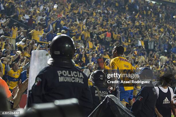 Jesus Duenas of Tigres celebrate with fans after scoring his team's first goal and forces a round of penalties during the Final second leg match...