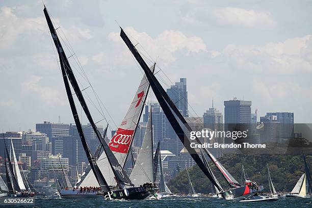 Perpetual Loyal' leads 'Wild Oats XI' and 'Scallywag' at the race start during the 2016 Sydney To Hobart Yacht Race on December 26, 2016 in Sydney,...