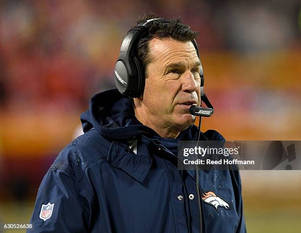 Head coach Gary Kubiak of the Denver Broncos watches from the sidelines during the game against the Kansas City Chiefs at Arrowhead Stadium on...