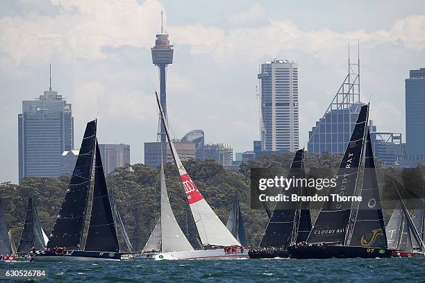 Perpetual Loyal' leads 'Wild Oats XI' and 'Scallywag' at the race start during the 2016 Sydney To Hobart Yacht Race on December 26, 2016 in Sydney,...