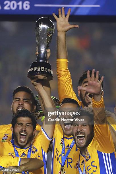 Players of Tigres raise the champions trophy after the Final second leg match between Tigres UANL and America as part of the Torneo Apertura 2016...