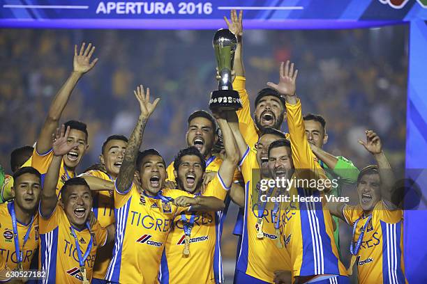 Players of Tigres raise the champions trophy after the Final second leg match between Tigres UANL and America as part of the Torneo Apertura 2016...