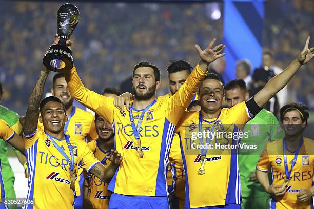 Andre Pierre Gignac of Tigres holds the champion trophy after the Final second leg match between Tigres UANL and America as part of the Torneo...