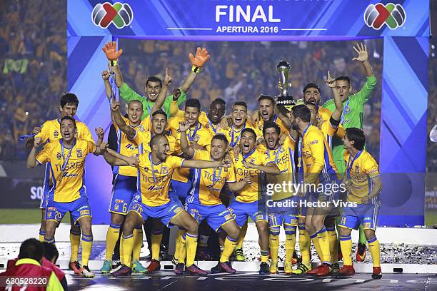 Players of Tigres raise the champions trophy after the Final second leg match between Tigres UANL and America as part of the Torneo Apertura 2016...