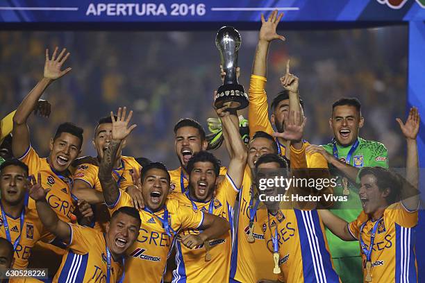 Players of Tigres raise the champions trophy after the Final second leg match between Tigres UANL and America as part of the Torneo Apertura 2016...