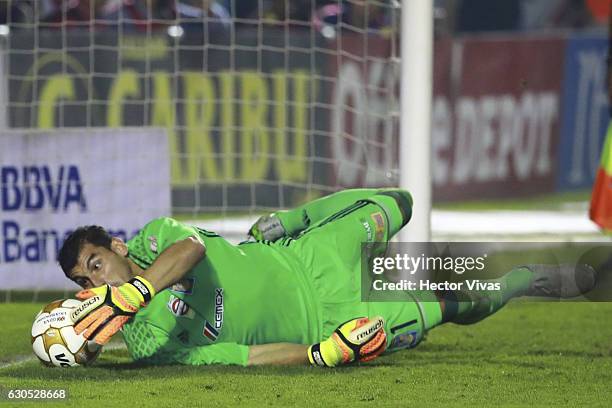 Nahuel Guzman of Tigres stops a penalty shot by William da Silva during the Final second leg match between Tigres UANL and America as part of the...