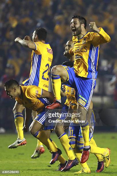 Andre Pierre Gignac of Tigres celebrates his team's victory in penalty series after the Final second leg match between Tigres UANL and America as...