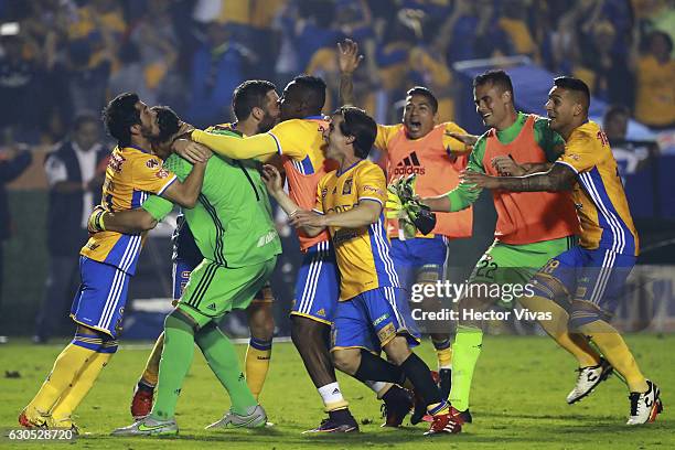 Players of Tigres celebrate with goalkeeper Nahuel Guzman after winning the game during the Final second leg match between Tigres UANL and America as...