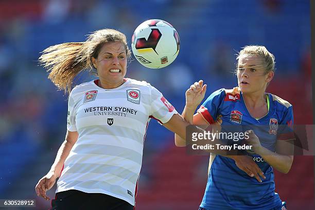Erica Holloway of the Wanderers and Cassidy Davis of the Jets contest the ball during the round eight W-League match between Newcastle and Western...
