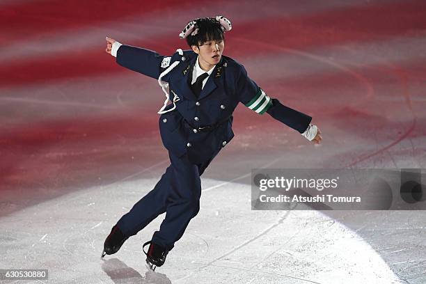 Kazuki Tomono of Japan performs his routine in the exhibition during the Japan Figure Skating Championships 2016 on December 26, 2016 in Kadoma,...