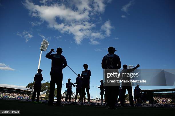 Hurricanes players stretch before the Big Bash League match between the Hobart Hurricanes and Sydney Stars at Blundstone Arena on December 26, 2016...