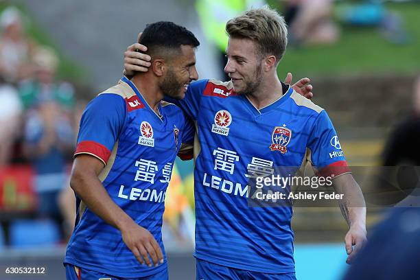 Andrew Nabbout and Andrew Hoole of the Jets celebrate a goal during the round 12 A-League match between the Newcastle Jets and the Wellington Phoenix...