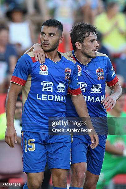 Andrew Nabbout and Mateo Poljak of the Jets celebrtate a goal during the round 12 A-League match between the Newcastle Jets and the Wellington...