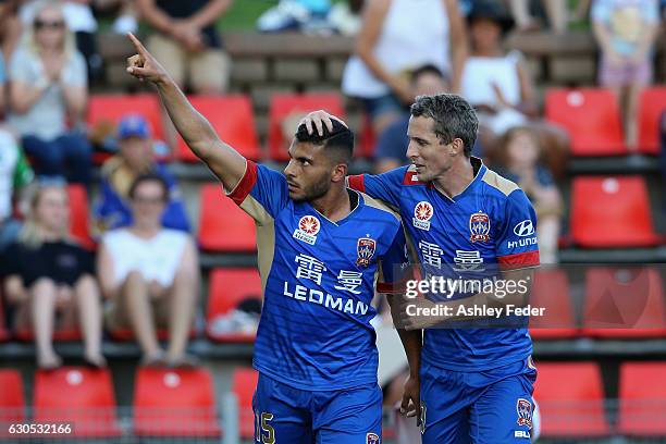 Andrew Nabbout and Morten Nordstrand of the Jets celebrate a goal during the round 12 A-League match between the Newcastle Jets and the Wellington...