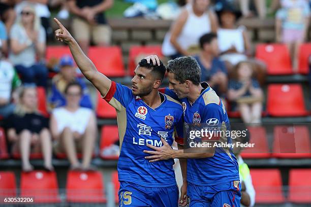 Andrew Nabbout and Morten Nordstrand of the Jets celebrate a goal during the round 12 A-League match between the Newcastle Jets and the Wellington...