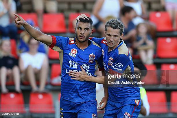 Andrew Nabbout and Morten Nordstrand of the Jets celebrate a goal during the round 12 A-League match between the Newcastle Jets and the Wellington...