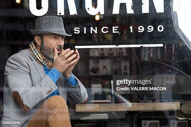 Syrian actor Jay Abdo poses in Hollywood, California, on December 22, 2016. / AFP / VALERIE MACON