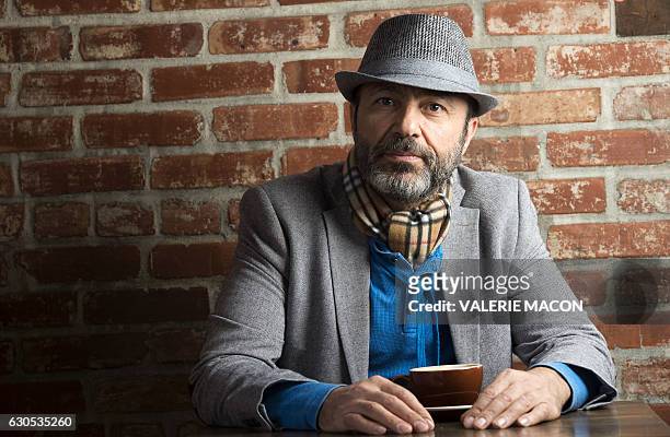 Syrian actor Jay Abdo poses in Hollywood, California, on December 22, 2016. / AFP / VALERIE MACON