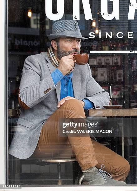 Syrian actor Jay Abdo poses in Hollywood, California, on December 22, 2016. / AFP / VALERIE MACON