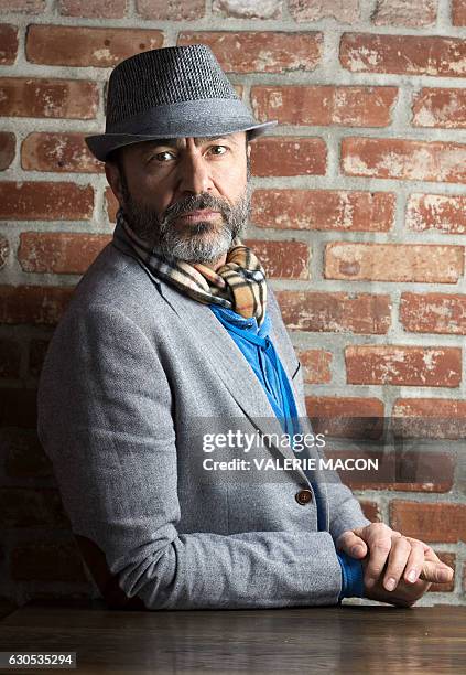 Syrian actor Jay Abdo poses in Hollywood, California, on December 22, 2016. / AFP / VALERIE MACON