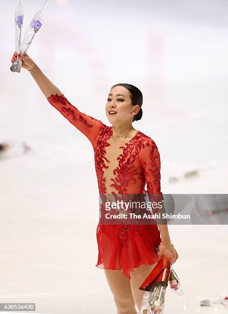Mao Asada applauds fans after competing in the Women's Singles Free Skating during day four of the 85th All Japan Figure Skating Championships at...