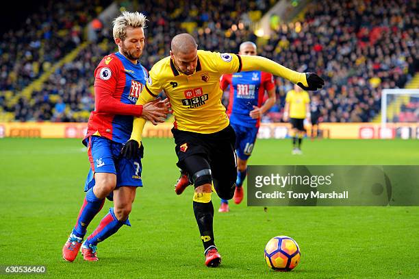 Adlene Guedioura of Watford battles for the ball with Yohan Cabaye of Crystal Palace during the Premier League match between Watford and Crystal...