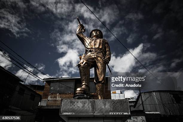 Miner statue is seen in La Rinconada, the highest permanent settlement in the world, in Puno, Peru on November 1, 2016. Miners work under a system...